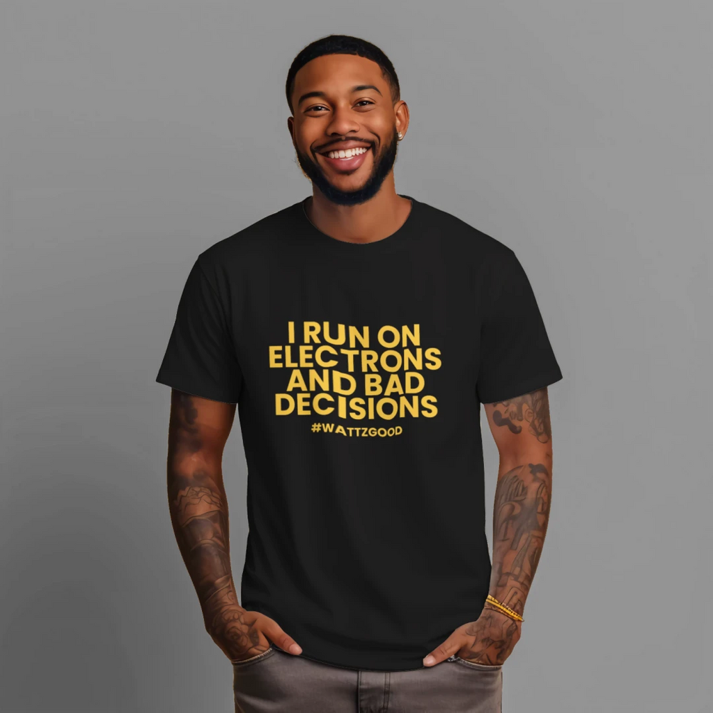 Man wearing the black Wattz Good "I Run on Electrons and Bad Decisions" EV graphic tee