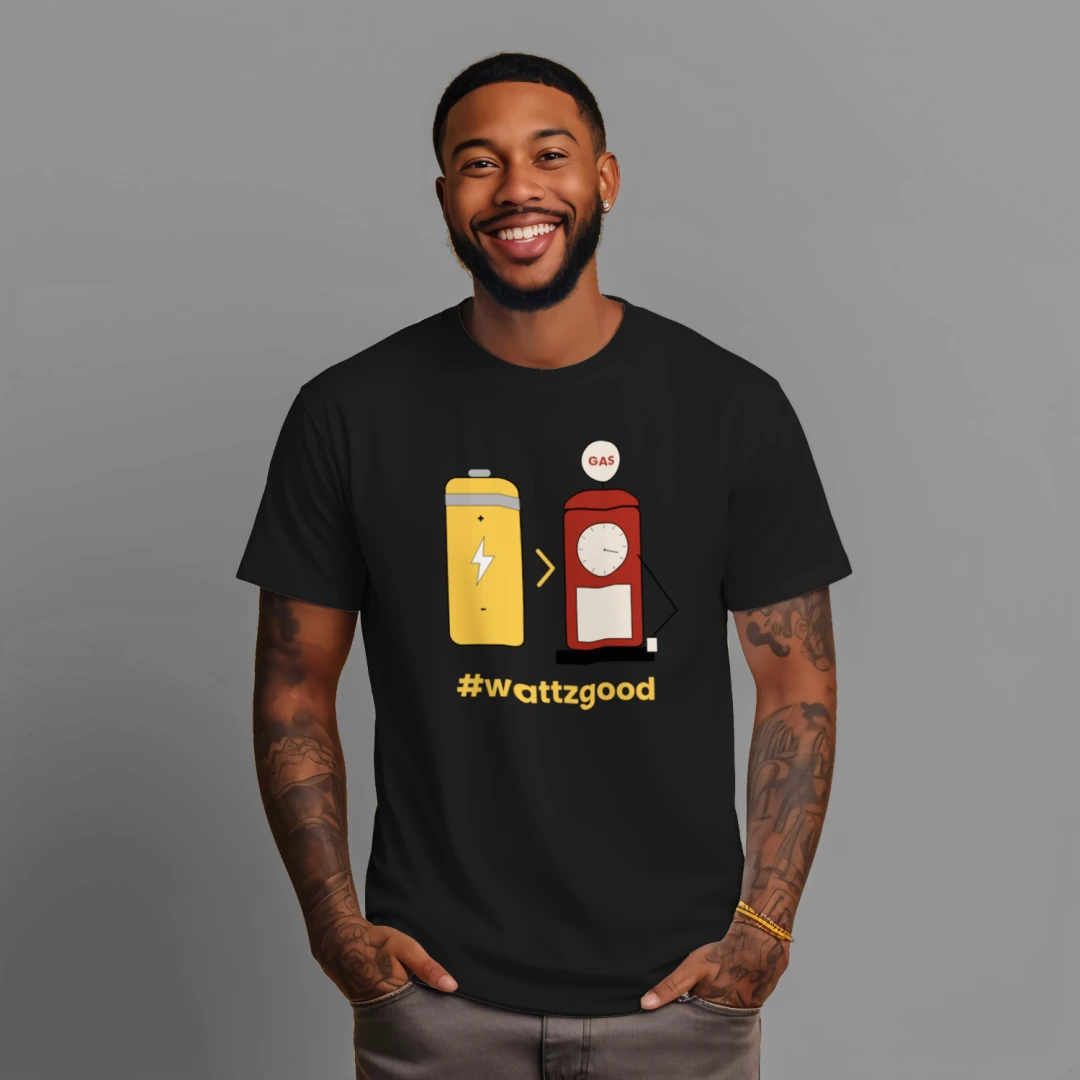 Man wearing the black Wattz Good "EV over GAS" graphic tee with a battery and gas pump design
