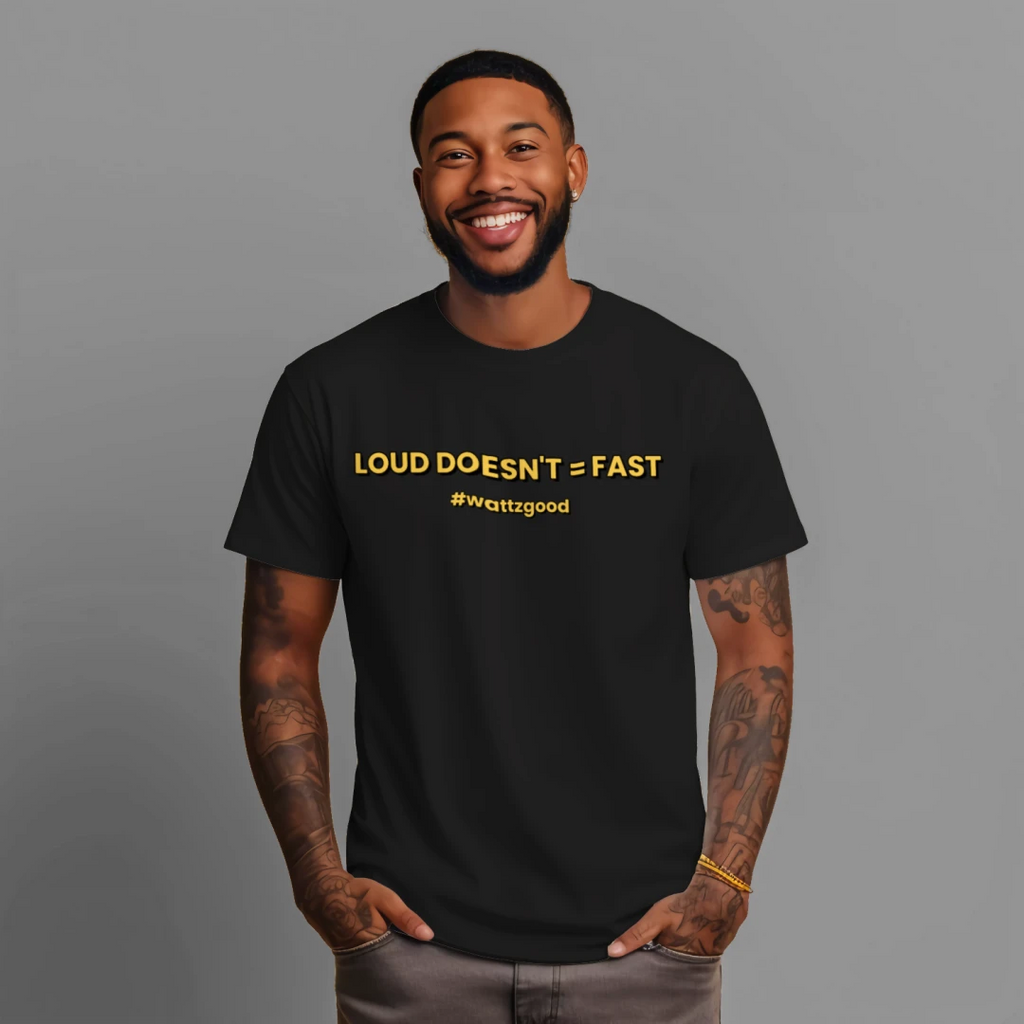 Man wearing the black Wattz Good "Loud Doesn't = Fast" EV graphic tee