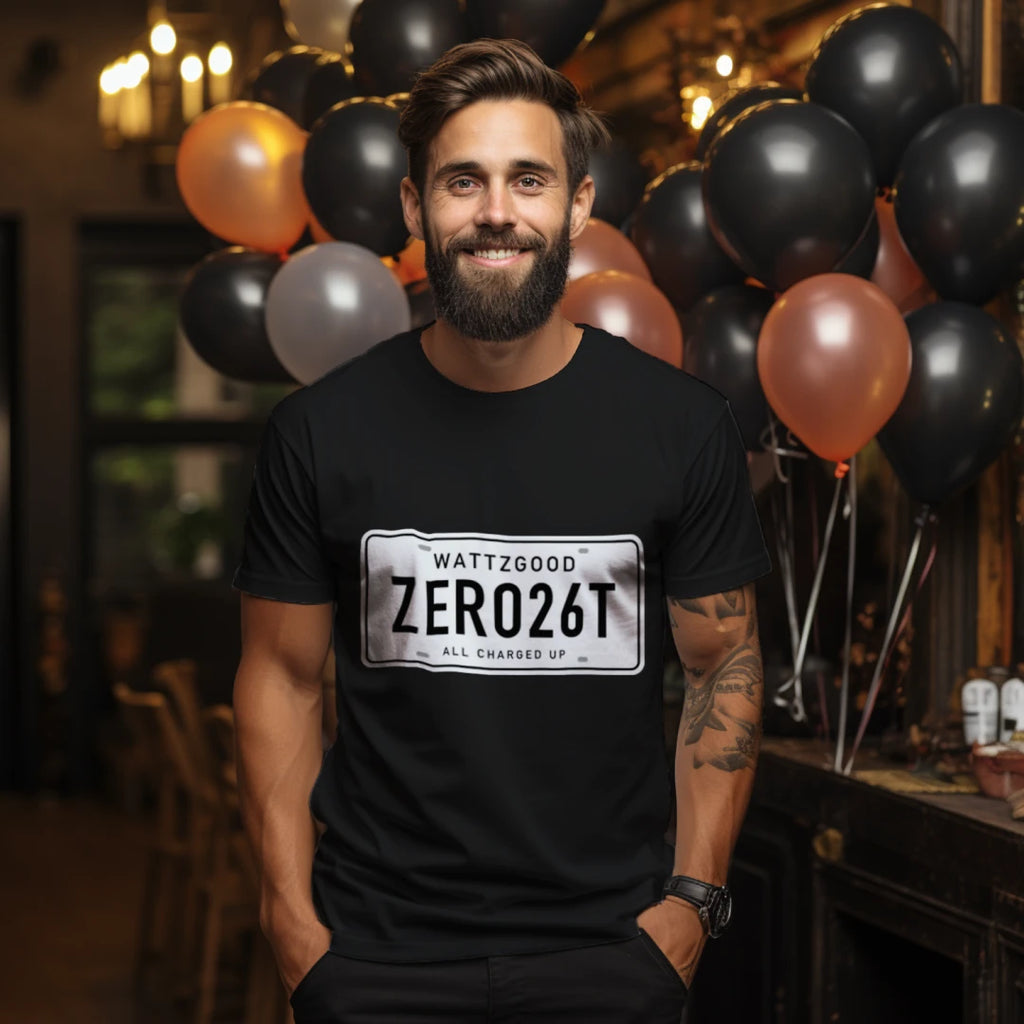 Man wearing the black Wattz Good ZERO26T license plate tee with WATTZGOOD and All Charged Up on the plate