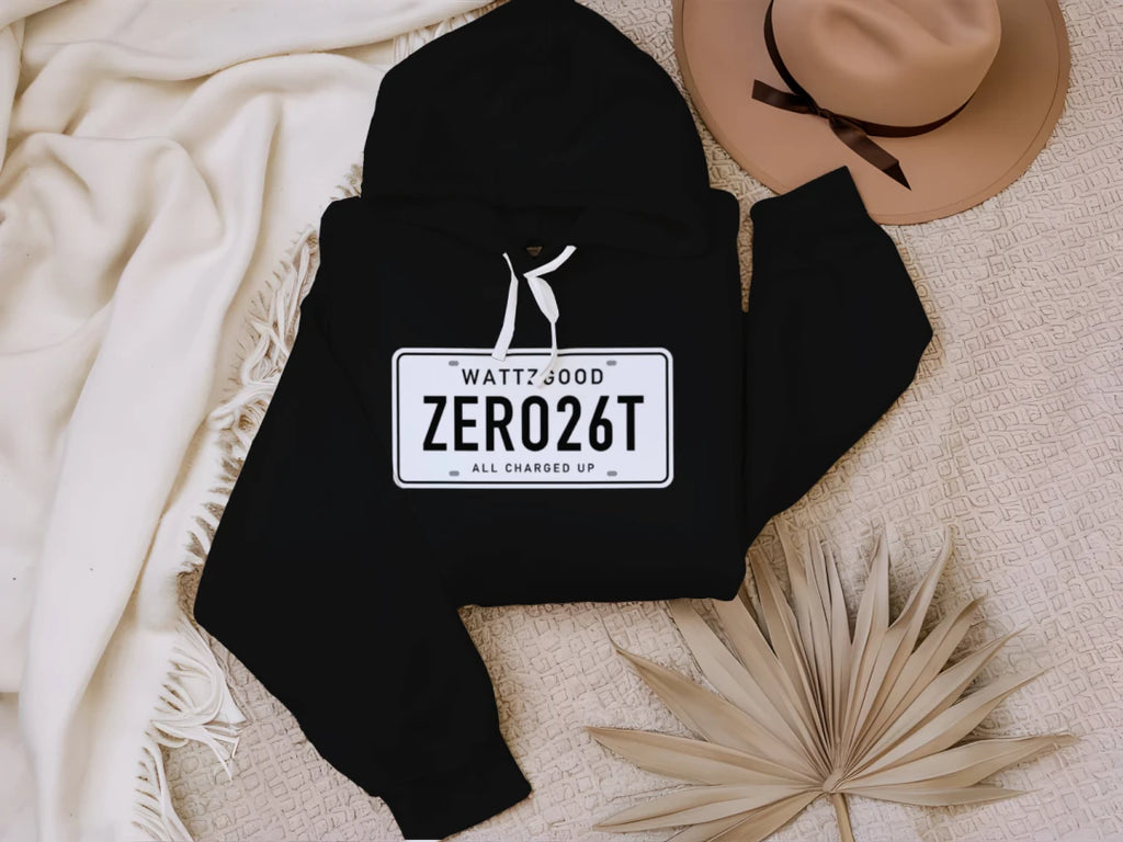 Person wearing the black Wattz Good ZERO26T License Plate EV hoodie, lifestyle photo